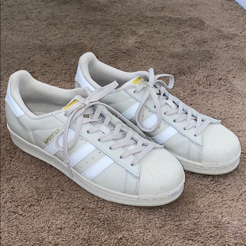 Beige and white superstar adidas